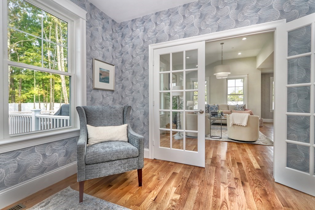73 Rowell Road, Unit 73 Middleton , MA 01923 - Photo 17 of 40 a living room with furniture and a window