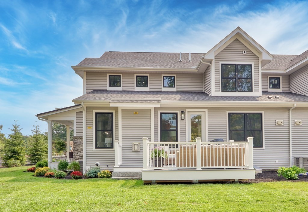 73 Rowell Road, Unit 73 Middleton , MA 01923 - Photo 37 of 40 a front view of a house with garden