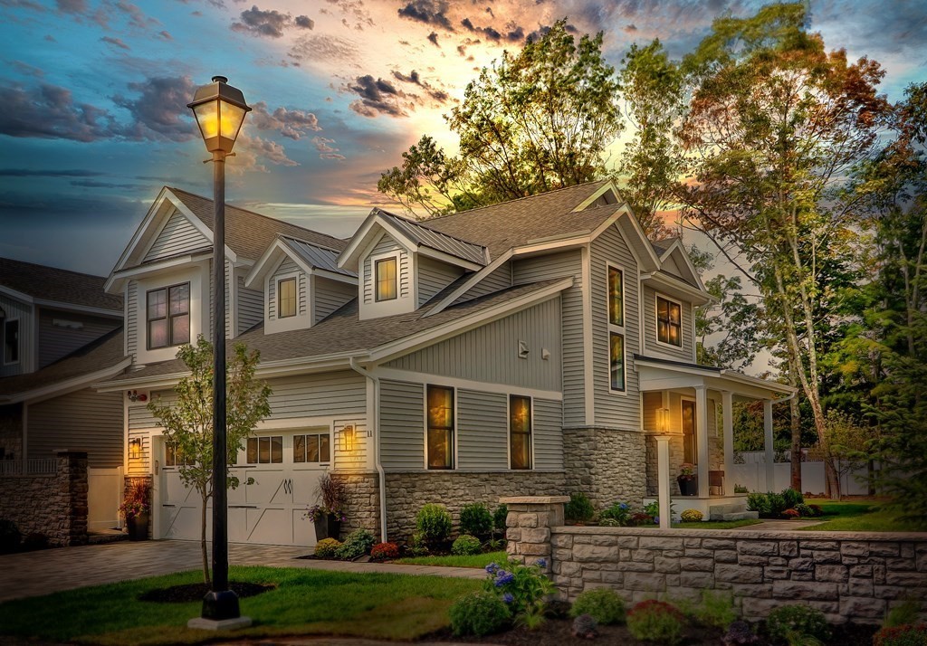 73 Rowell Road, Unit 73 Middleton , MA 01923 - Photo 38 of 40 a front view of a house with a yard
