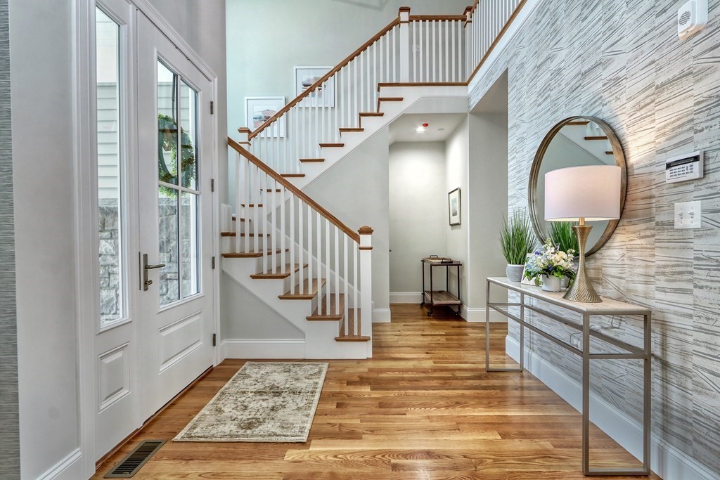 73 Rowell Road, Unit 73 Middleton , MA 01923 - Photo 5 of 40 a view of an entryway with wooden floor