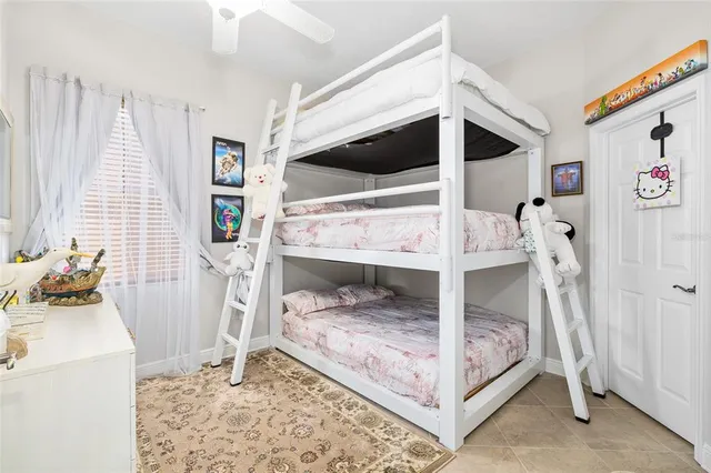 a bed room with a bed and a window