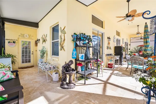 a view of a living room with bathroom