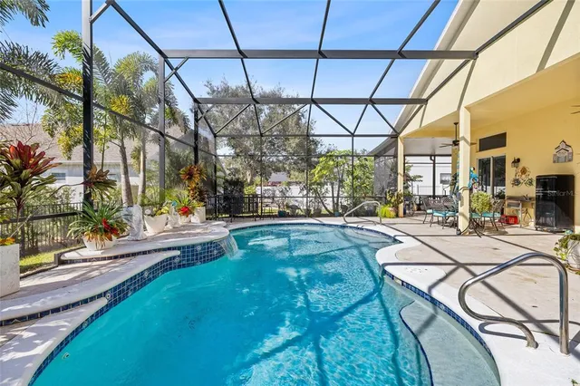 a view of yard with patio