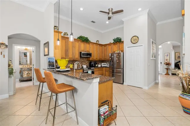 a view of a kitchen and dining room