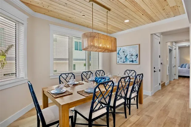 a bedroom with a large bed and a large window