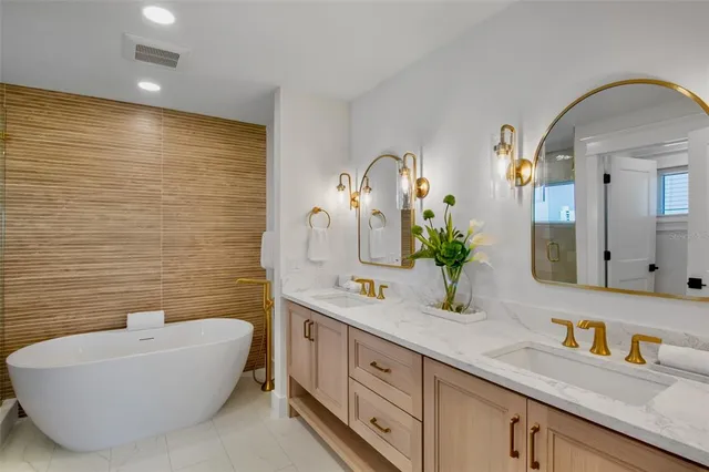 a view of a house with a swimming pool outdoor seating