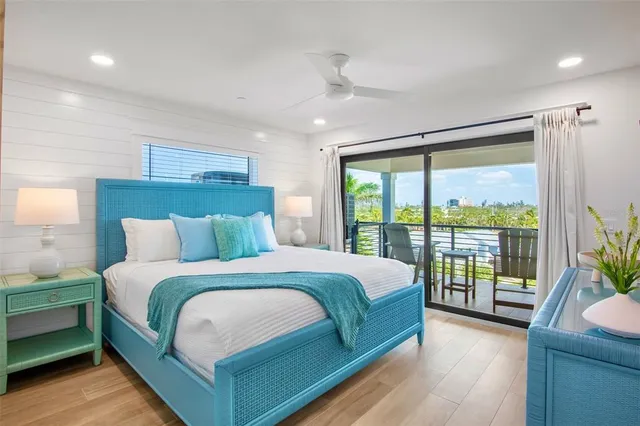 a view of city from balcony having outdoor seating