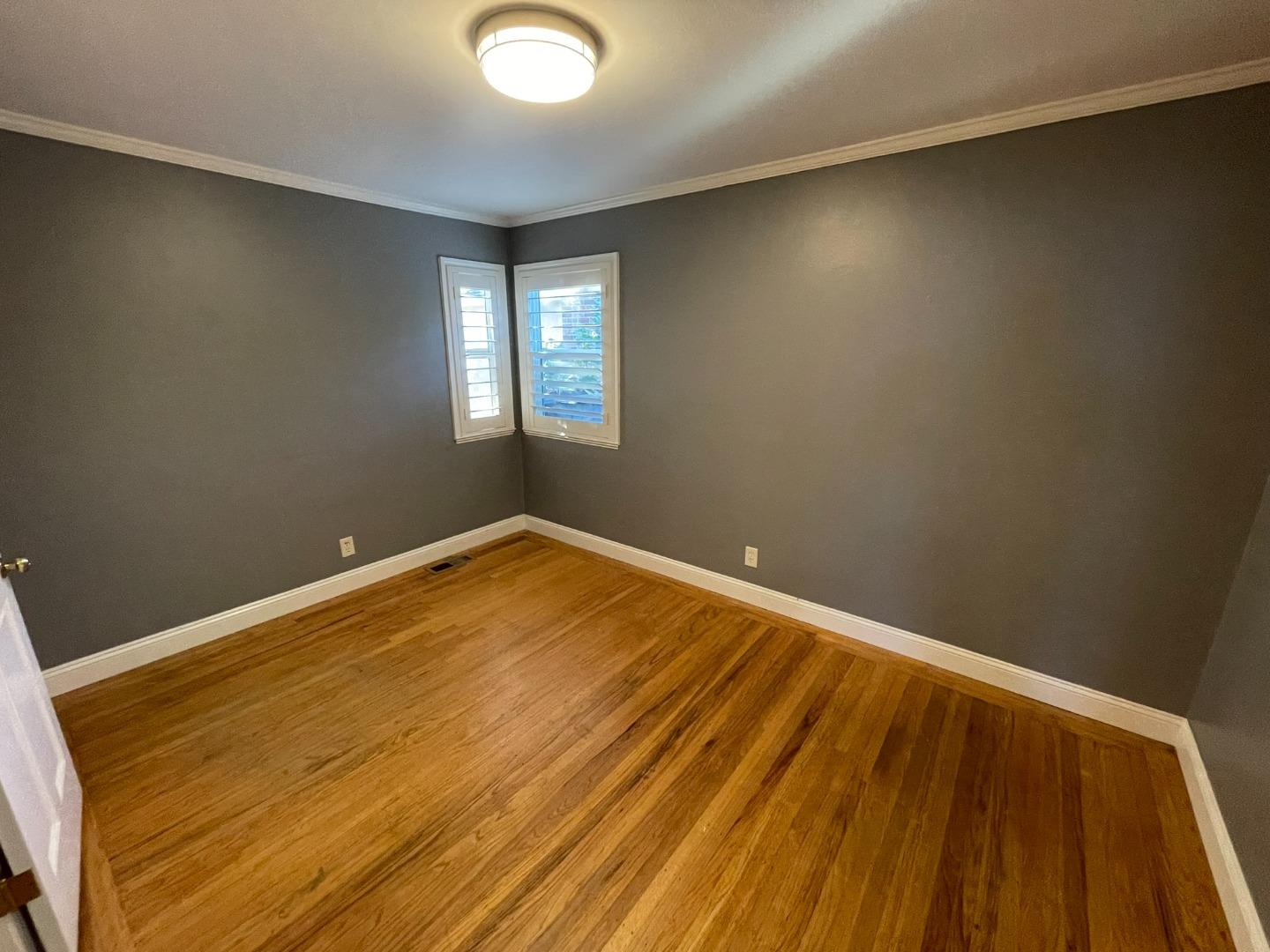 3709 Casanova Drive San Mateo, CA 94403 - Photo 8 of 13 a view of a room with wooden floor and fan