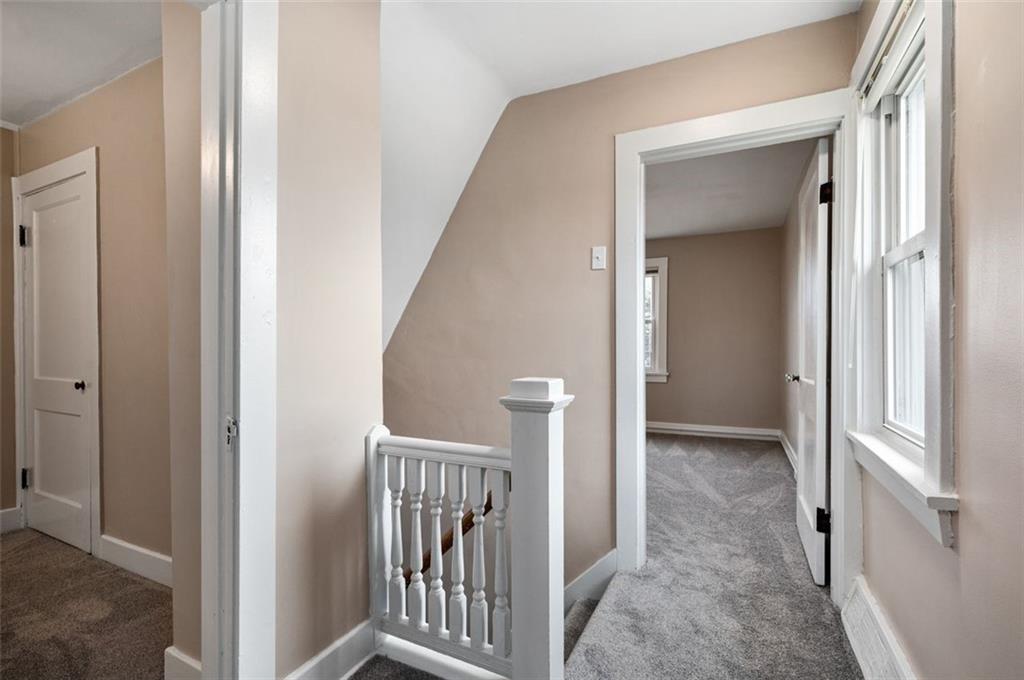 800 State Street Duquesne, PA 15110 - Photo 12 of 27 a view of a hallway with a door and stairs
