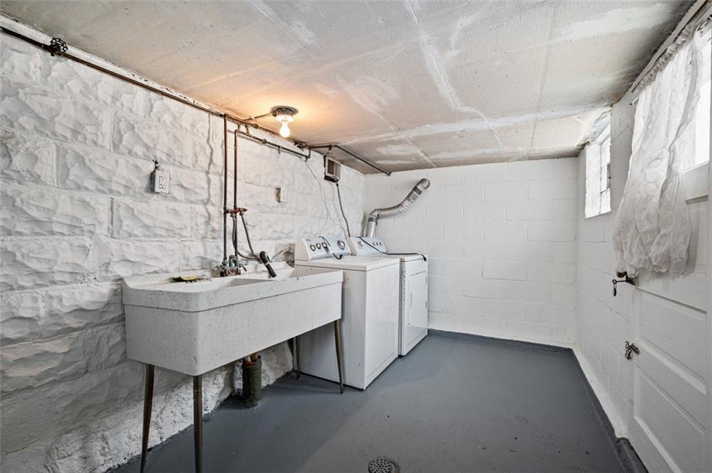 800 State Street Duquesne, PA 15110 - Photo 19 of 27 a bathroom with a sink a toilet and shower