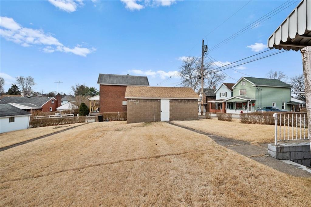 800 State Street Duquesne, PA 15110 - Photo 26 of 27 a front view of a house with a yard and seating space