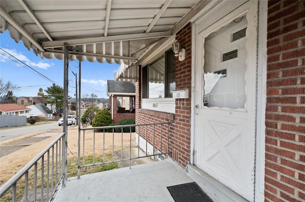 800 State Street Duquesne, PA 15110 - Photo 3 of 27 a view of a porch with a door