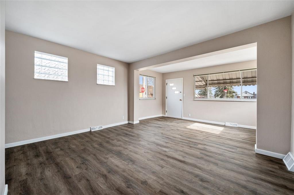 800 State Street Duquesne, PA 15110 - Photo 6 of 27 a view of an empty room with wooden floor and a window