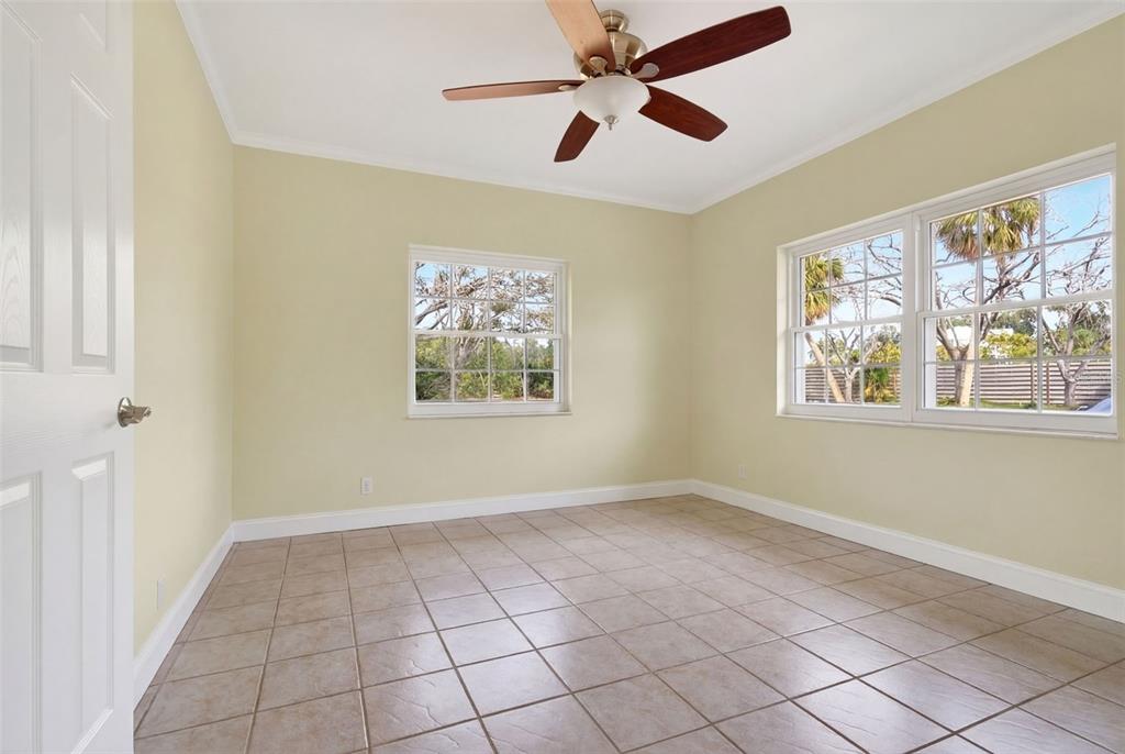 7108 Midnight Pass Road Sarasota, FL 34242 - Photo 49 of 83 a view of an empty room and window