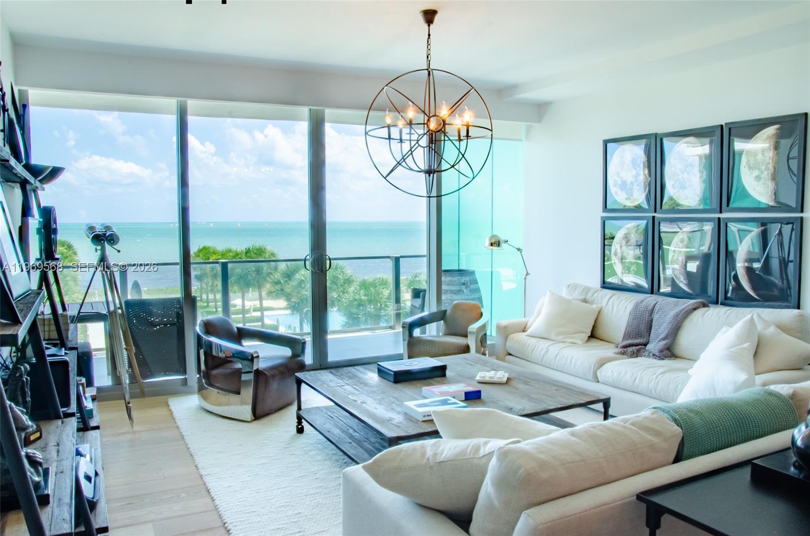 350 Ocean Drive, Unit 406N Key Biscayne, FL 33149 - Photo 20 of 41 a living room with furniture and a large window