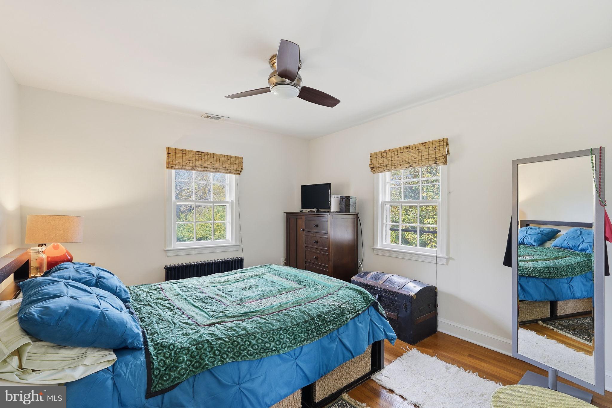 8209 Meadowbrook Lane Chevy Chase, MD 20815 - Photo 16 of 24 a bedroom with a bed and a window
