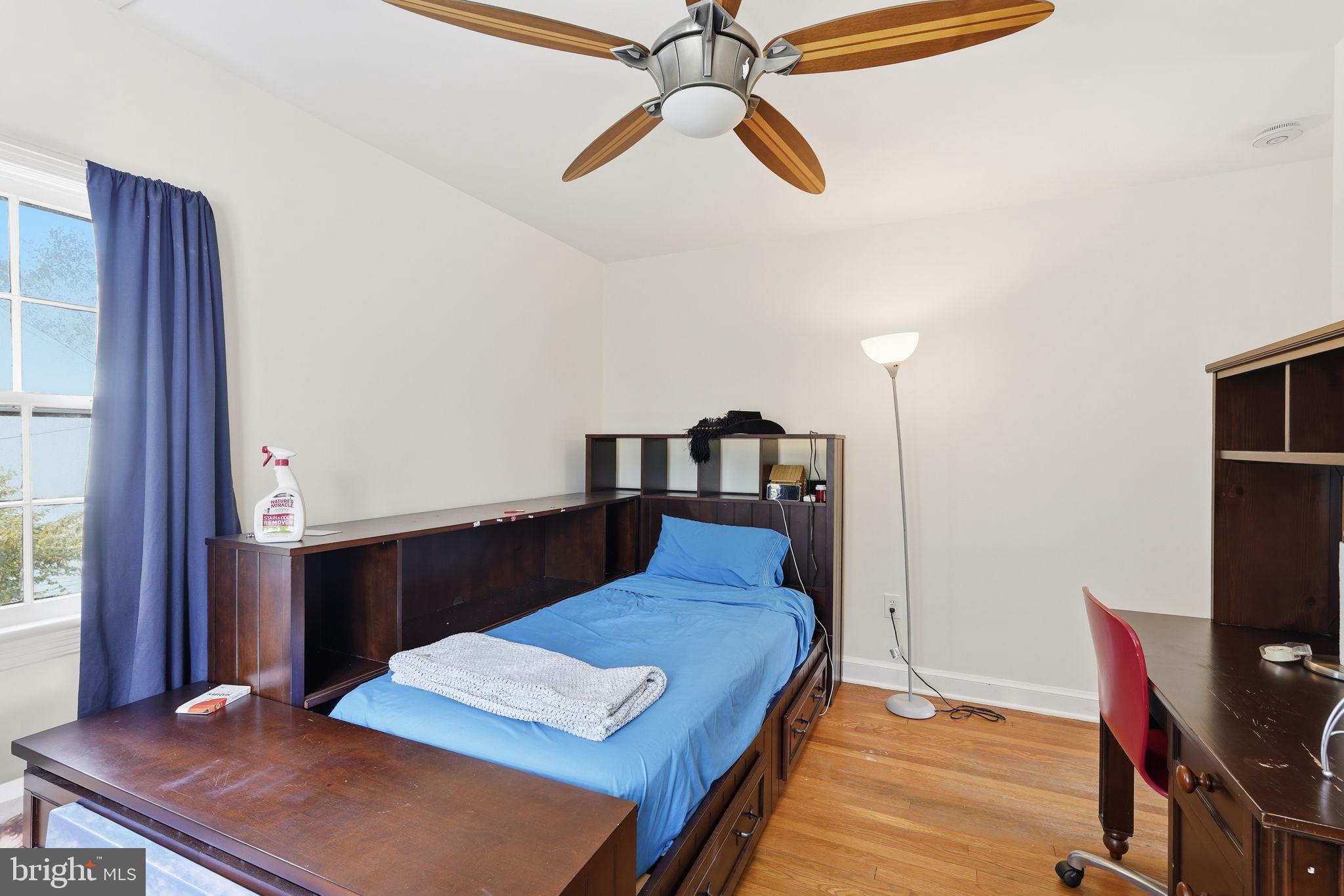 8209 Meadowbrook Lane Chevy Chase, MD 20815 - Photo 19 of 24 a bed room with a bed and a desk