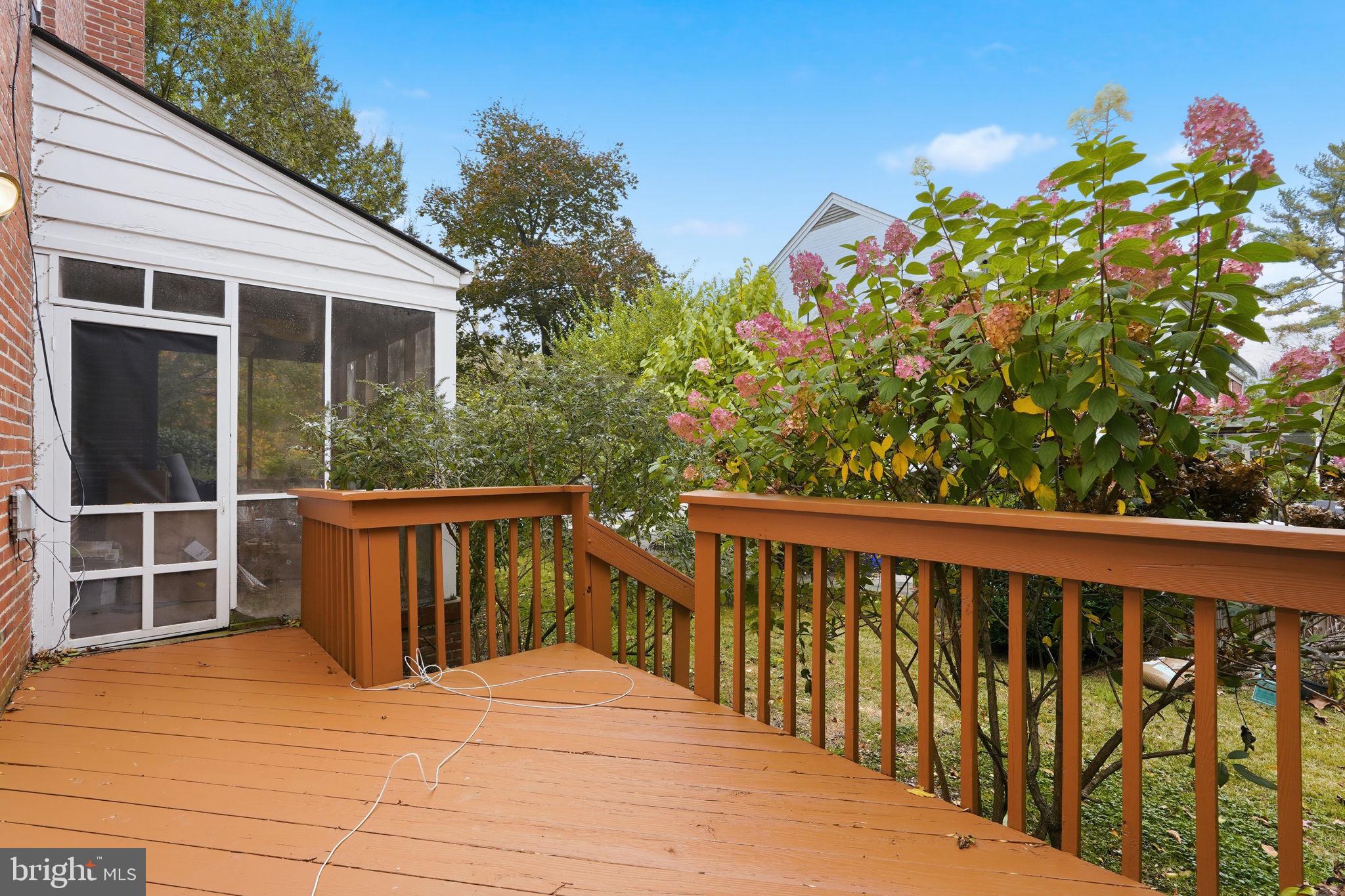 8209 Meadowbrook Lane Chevy Chase, MD 20815 - Photo 9 of 24 a balcony with wooden floor and fence