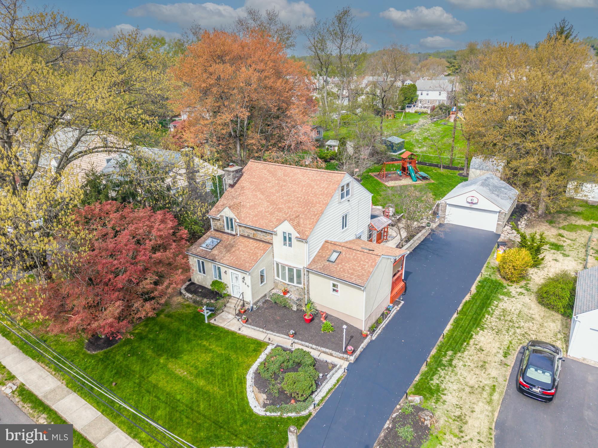 320 Prospect Road Springfield, PA 19064 - Photo 1 of 78 an aerial view of a house with a garden