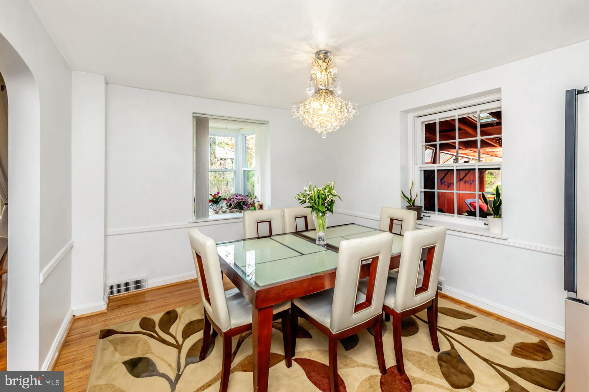 320 Prospect Road Springfield, PA 19064 - Photo 11 of 78 a view of a dining room with furniture and chandelier