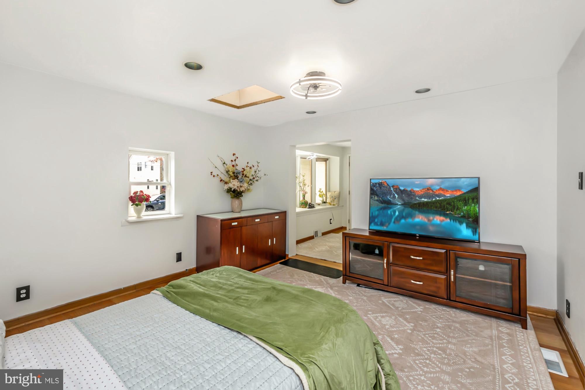 320 Prospect Road Springfield, PA 19064 - Photo 23 of 78 a bedroom with furniture and a flat screen tv