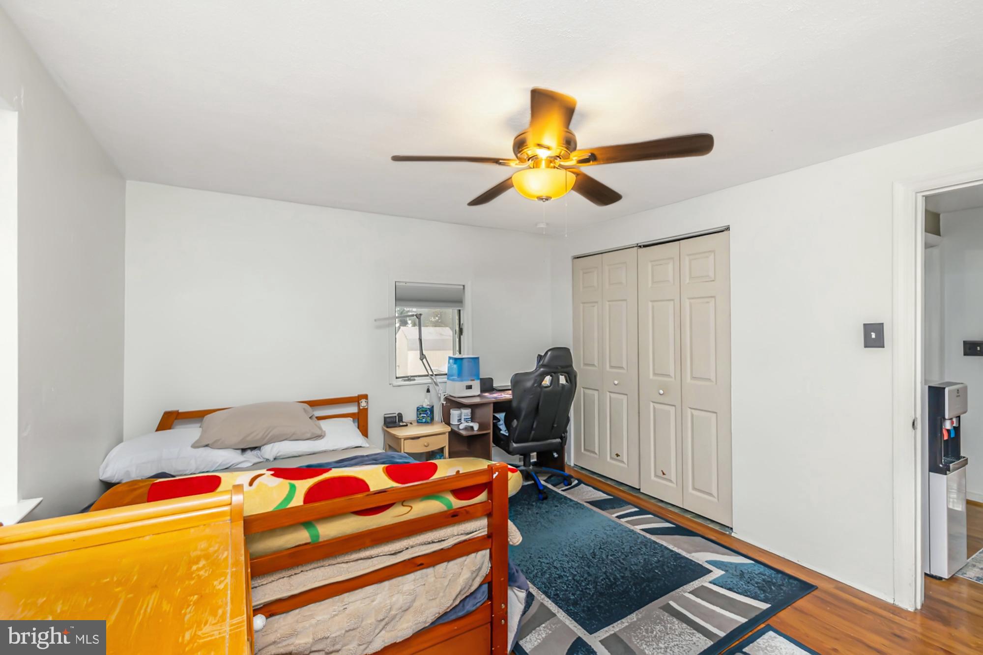 320 Prospect Road Springfield, PA 19064 - Photo 36 of 78 a bedroom with a bed and a table in it