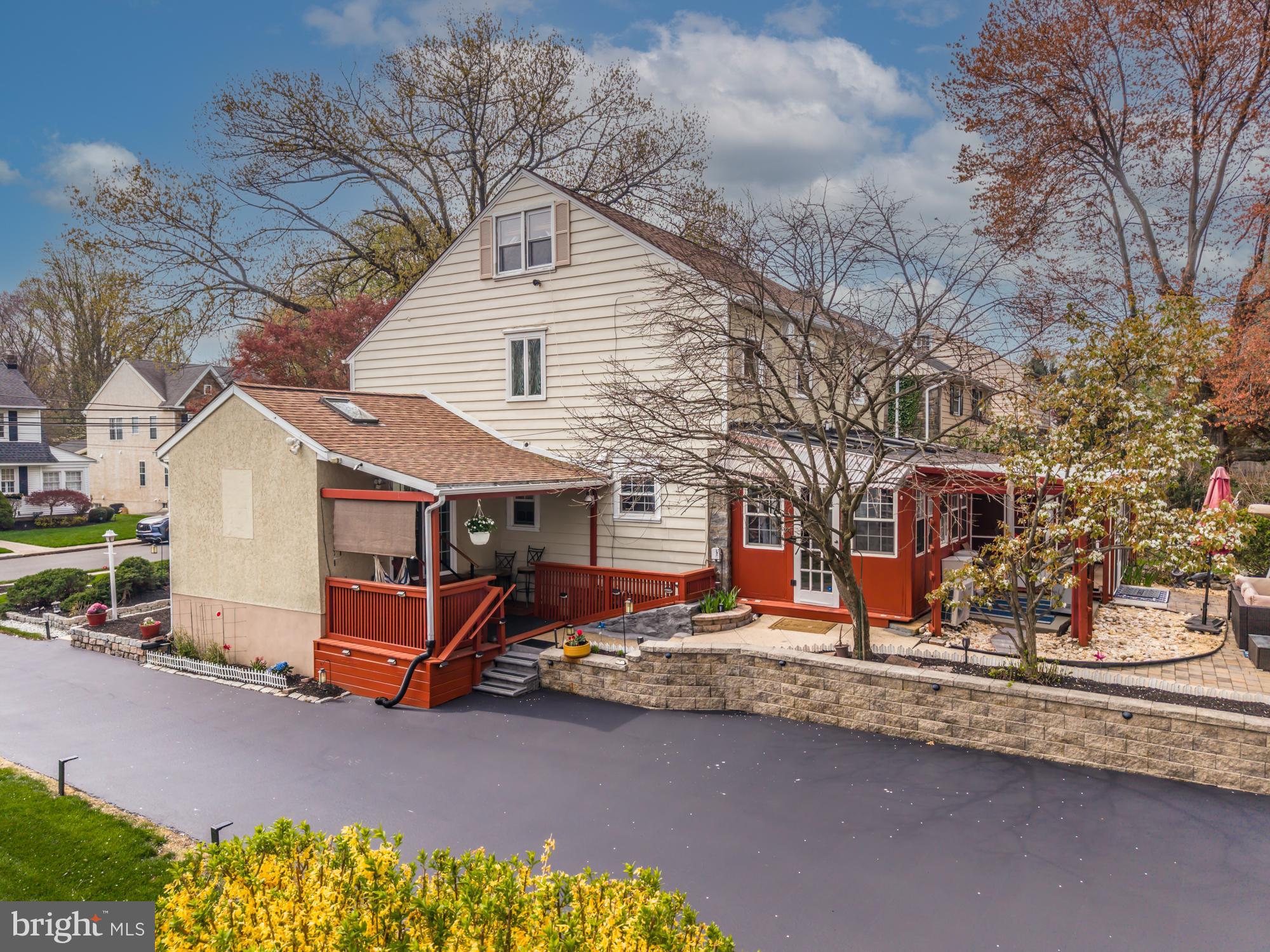 320 Prospect Road Springfield, PA 19064 - Photo 58 of 78 a backyard of a house with barbeque oven table and chairs
