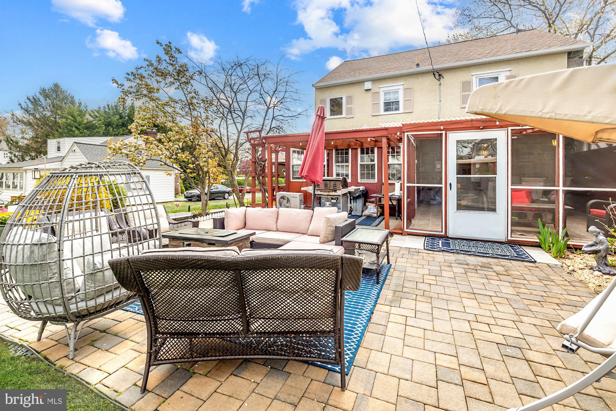 320 Prospect Road Springfield, PA 19064 - Photo 65 of 78 a view of a patio with dining table and chairs with wooden floor and fence