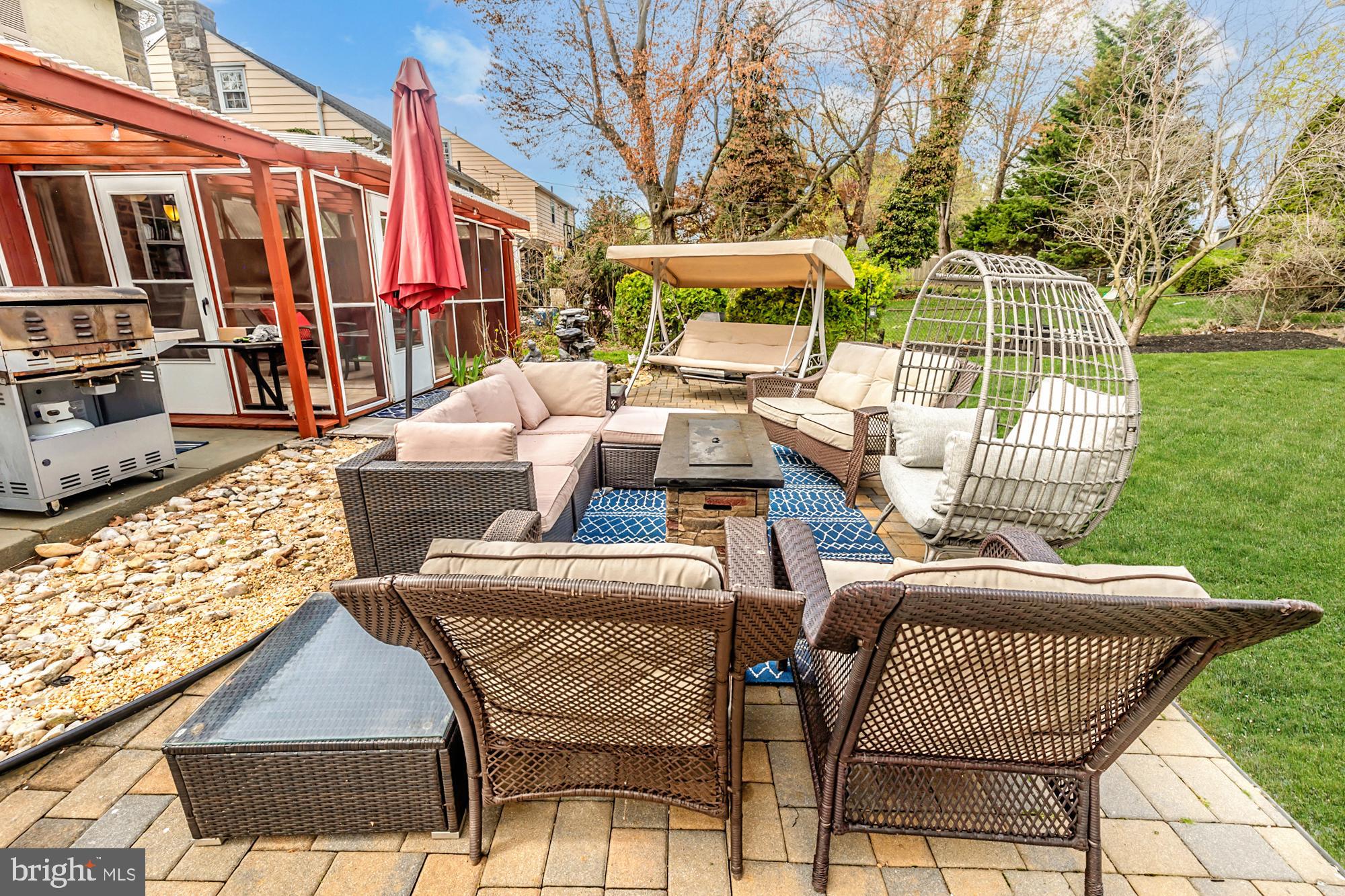 320 Prospect Road Springfield, PA 19064 - Photo 67 of 78 a view of a patio with couches chairs and a big yard