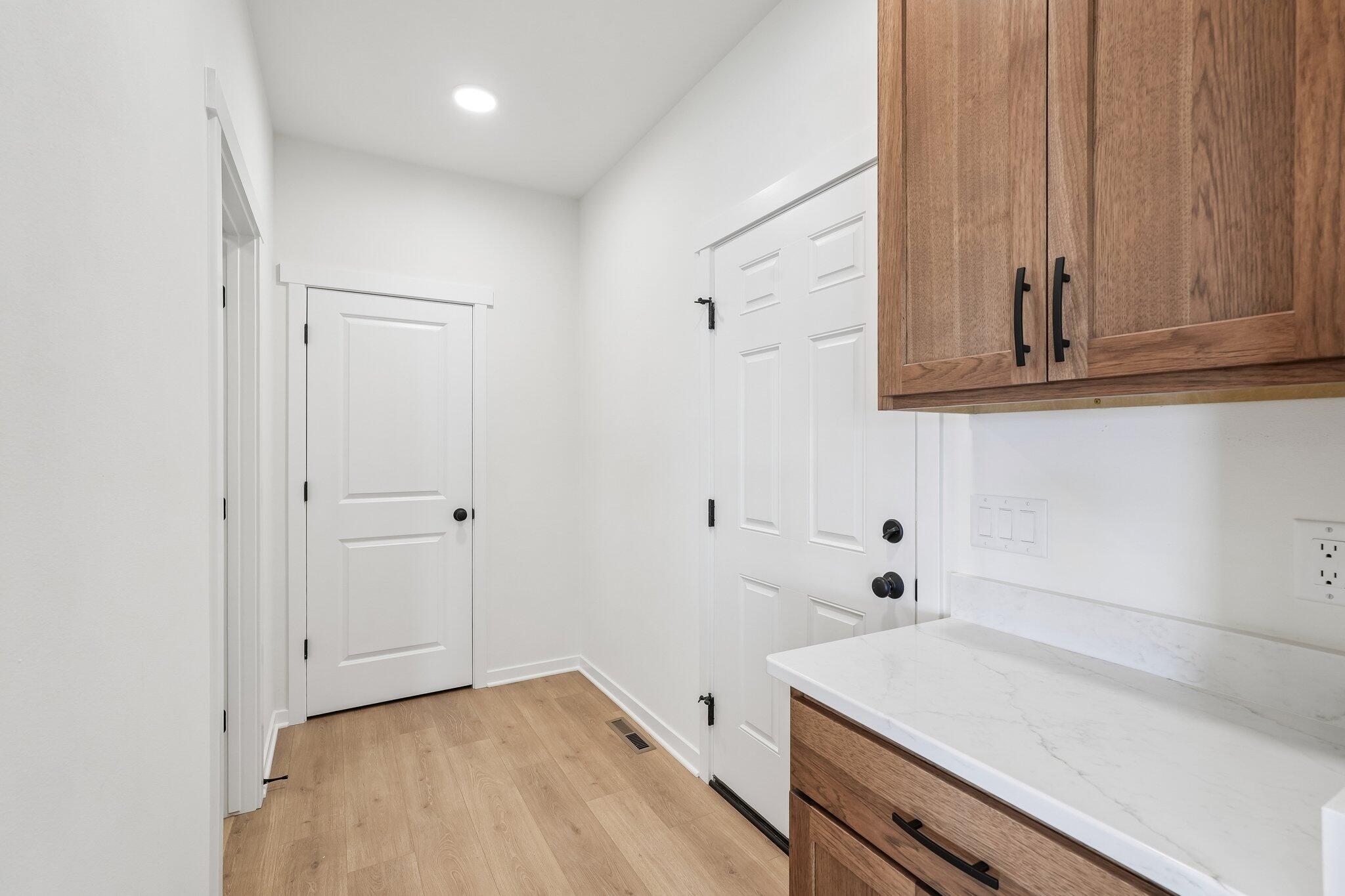 438 Sandstone Street Slinger, WI 53086 - Photo 19 of 29 Rear Foyer w/ Drop Zone
