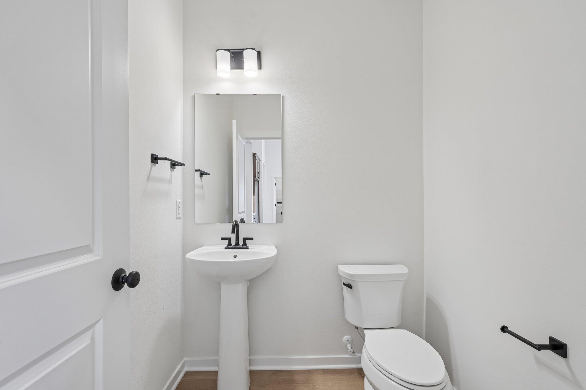 438 Sandstone Street Slinger, WI 53086 - Photo 21 of 29 Powder Bathroom