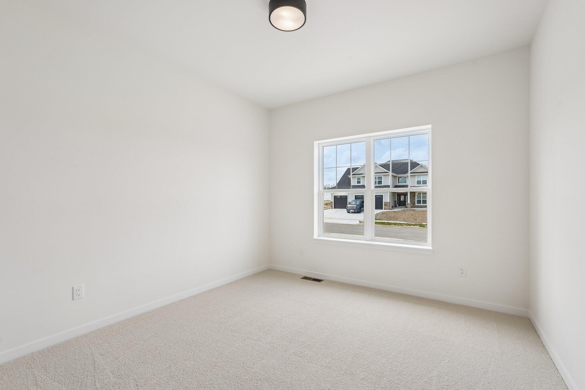 438 Sandstone Street Slinger, WI 53086 - Photo 23 of 29 Bedroom 2 w/ WIC