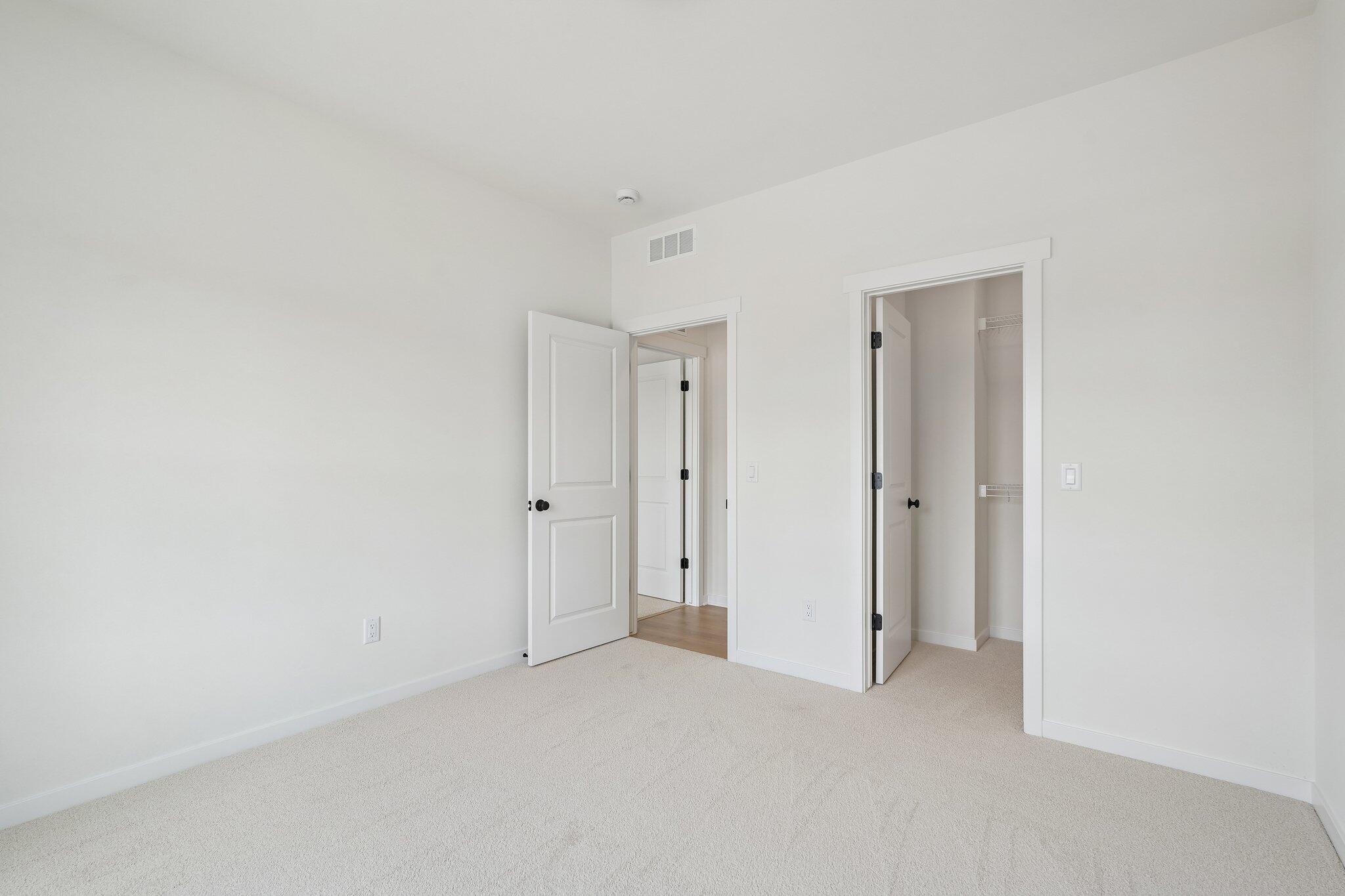 438 Sandstone Street Slinger, WI 53086 - Photo 24 of 29 Bedroom 2 w/ WIC