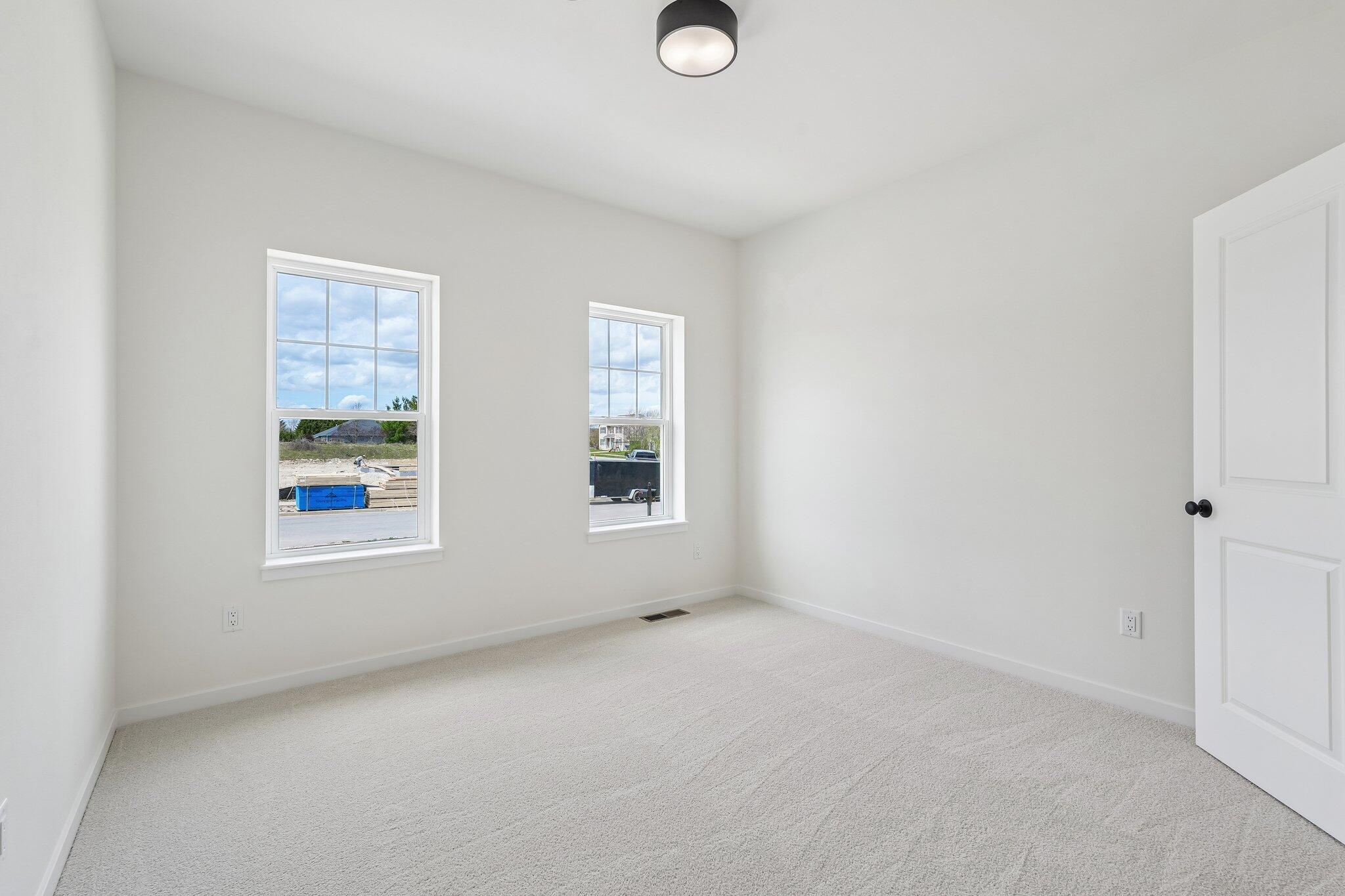 438 Sandstone Street Slinger, WI 53086 - Photo 25 of 29 Bedroom 3 w/ WIC