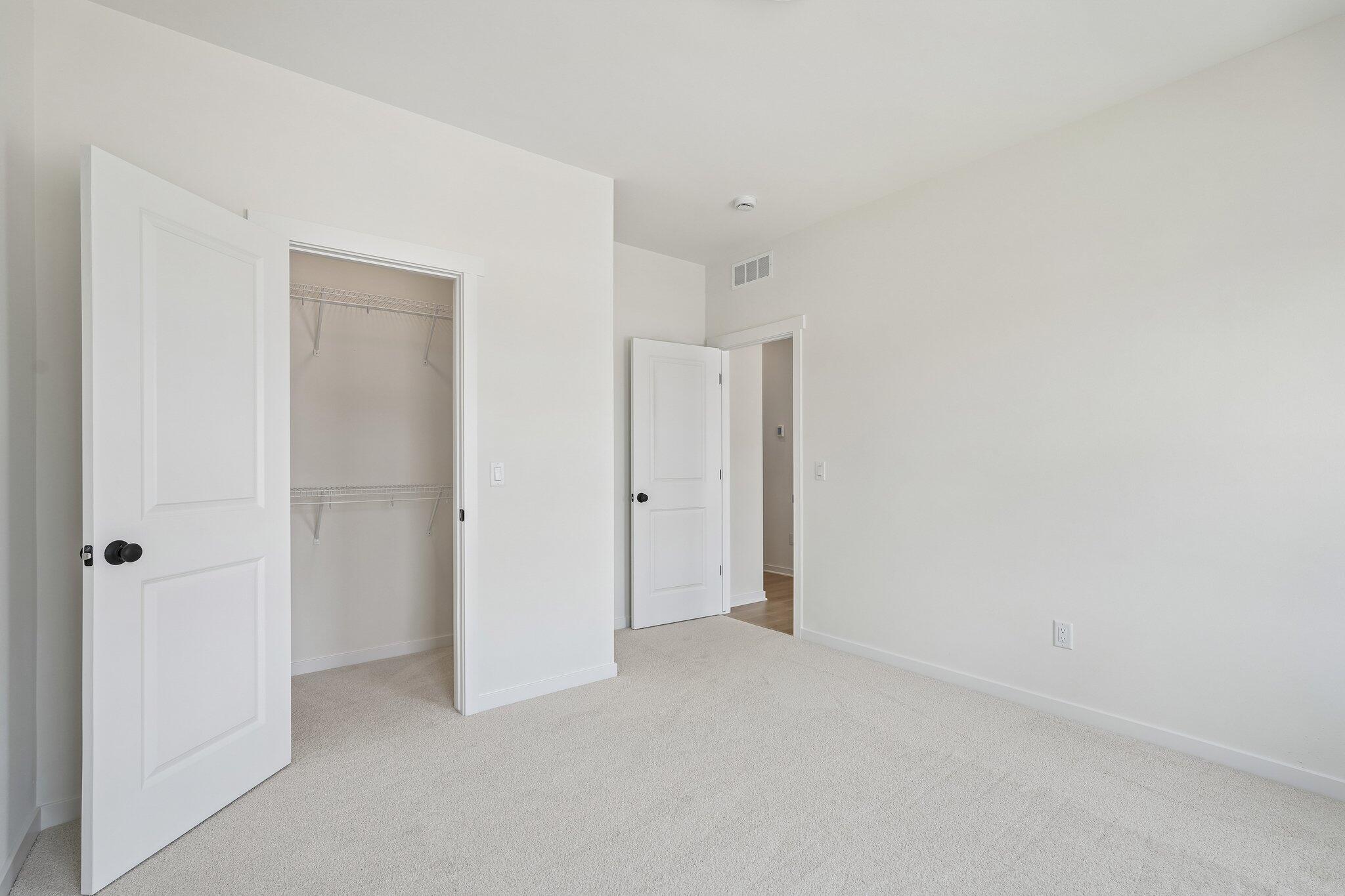 438 Sandstone Street Slinger, WI 53086 - Photo 26 of 29 Bedroom 3 w/ WIC