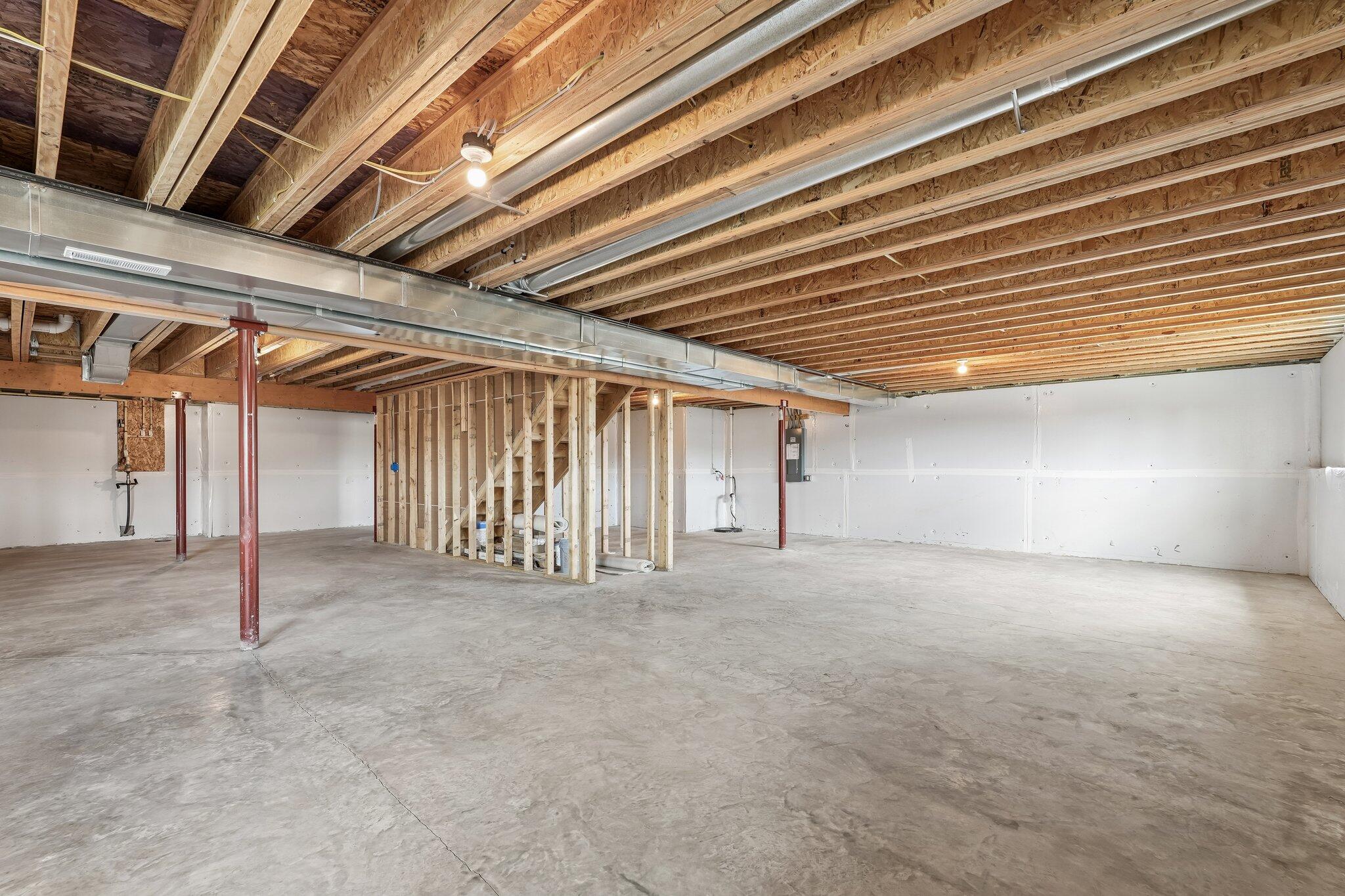 438 Sandstone Street Slinger, WI 53086 - Photo 27 of 29 Lower Level w/ Partial Exposure