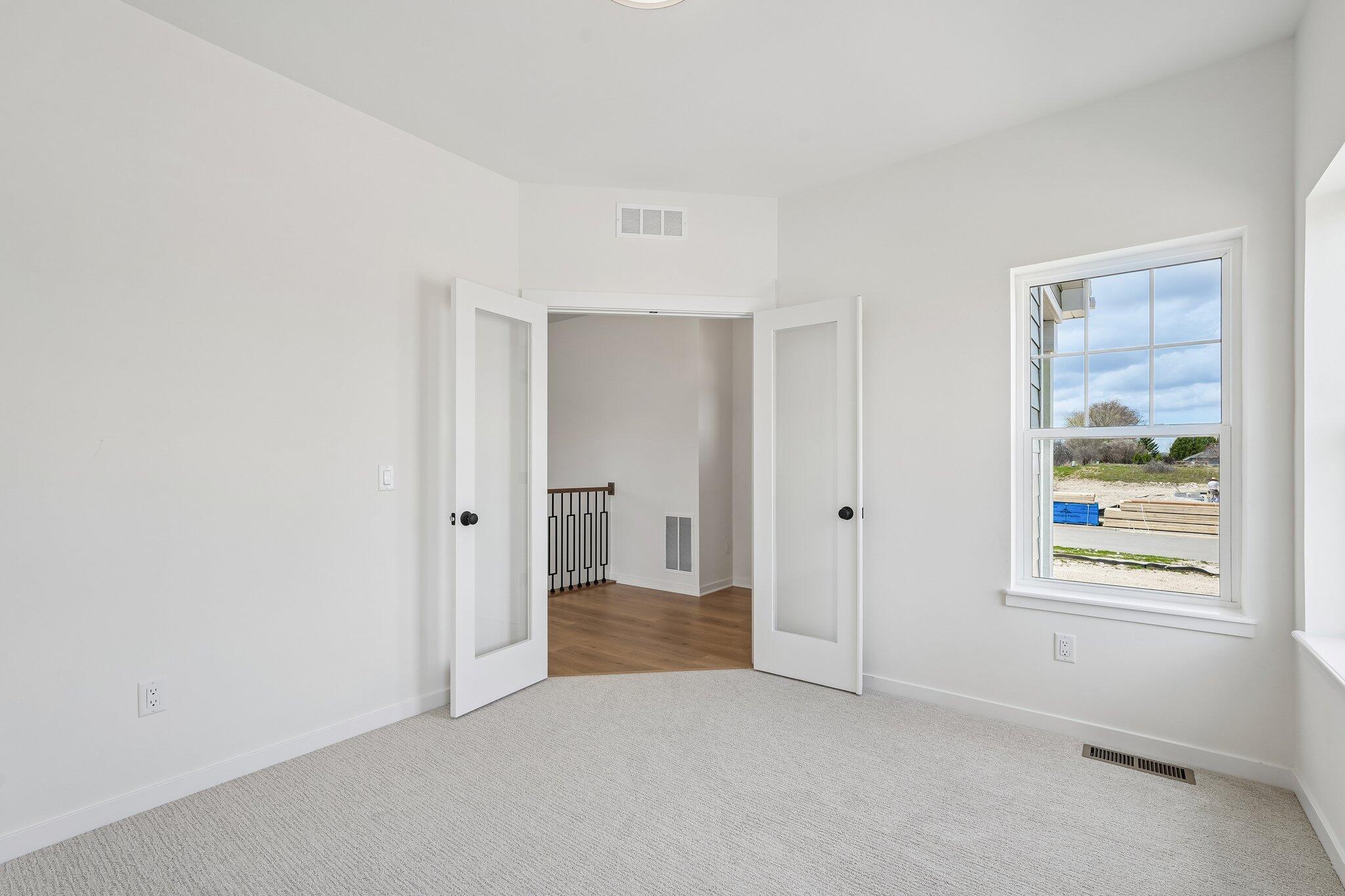 438 Sandstone Street Slinger, WI 53086 - Photo 5 of 29 French Doors to Close off the Space