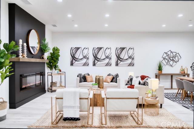 20362 Plaina Road Apple Valley, CA 92307 - Photo 12 of 29 a living room with furniture and a potted plant