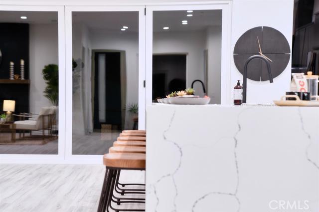 20362 Plaina Road Apple Valley, CA 92307 - Photo 5 of 29 a lobby with furniture and wooden floor