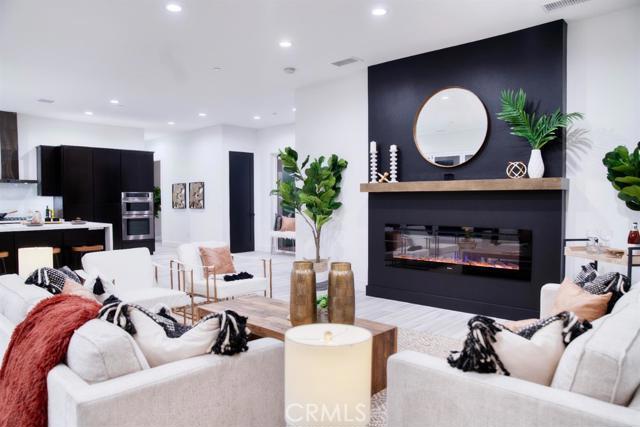 20362 Plaina Road Apple Valley, CA 92307 - Photo 10 of 29 a living room with furniture a fireplace and a potted plant