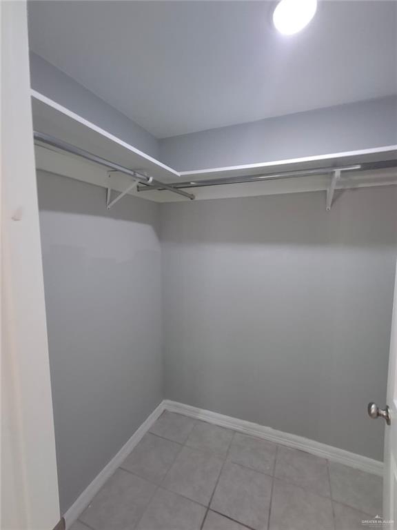 2104 Multi National, Unit C Harlingen, TX 78550 - Photo 9 of 14 a view of a room with racks on the wall