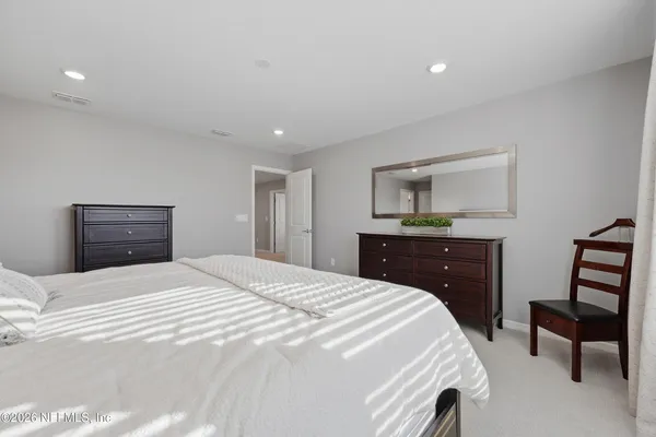 a view of a swimming pool with a yard