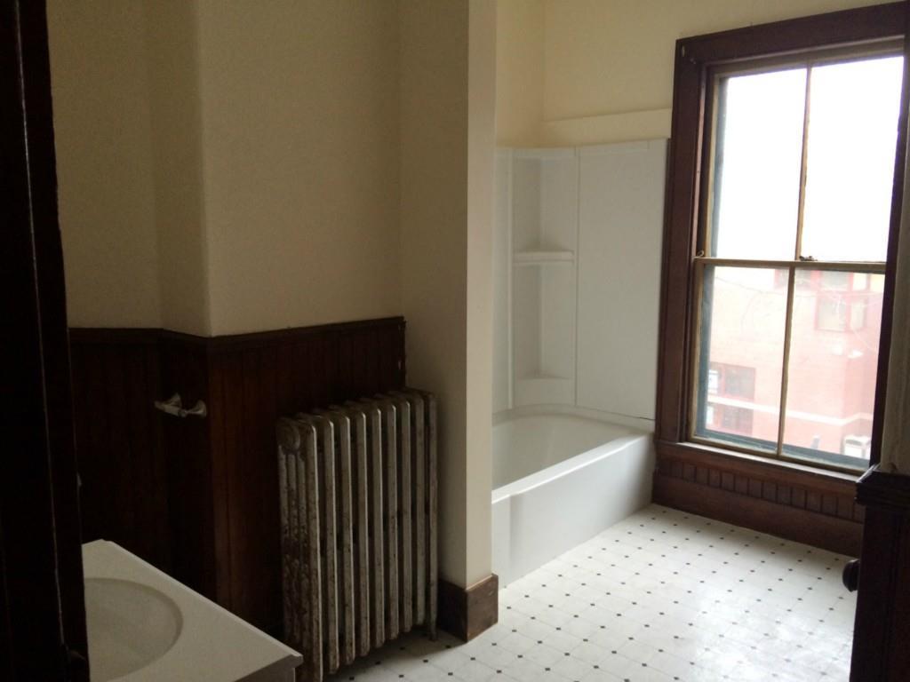 9 Spring Street Westbrook, ME 04092 - Photo 7 of 30 Remodeled bath is large and bright.