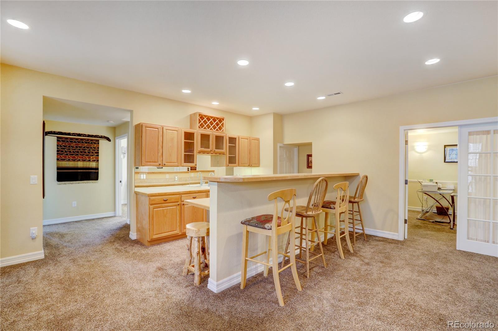 634 Foxtail Circle Black Hawk, CO 80422 - Photo 23 of 40 a kitchen with a table and chairs