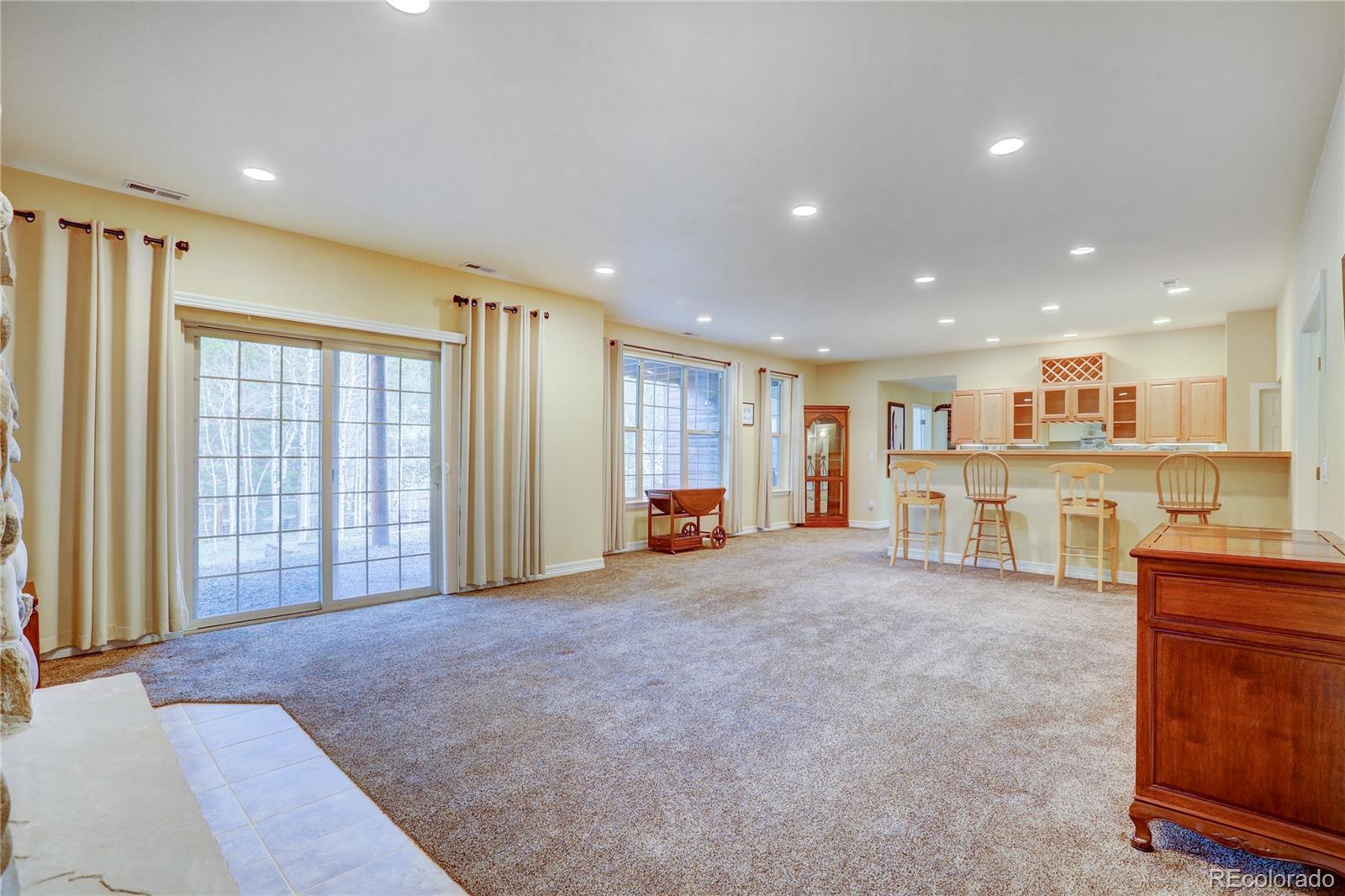 634 Foxtail Circle Black Hawk, CO 80422 - Photo 25 of 40 a view of an empty room with a cabinet and a window