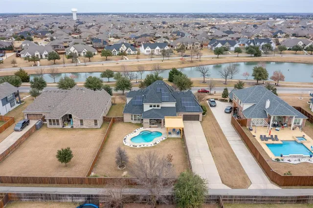 an aerial view of a house with a outdoor space