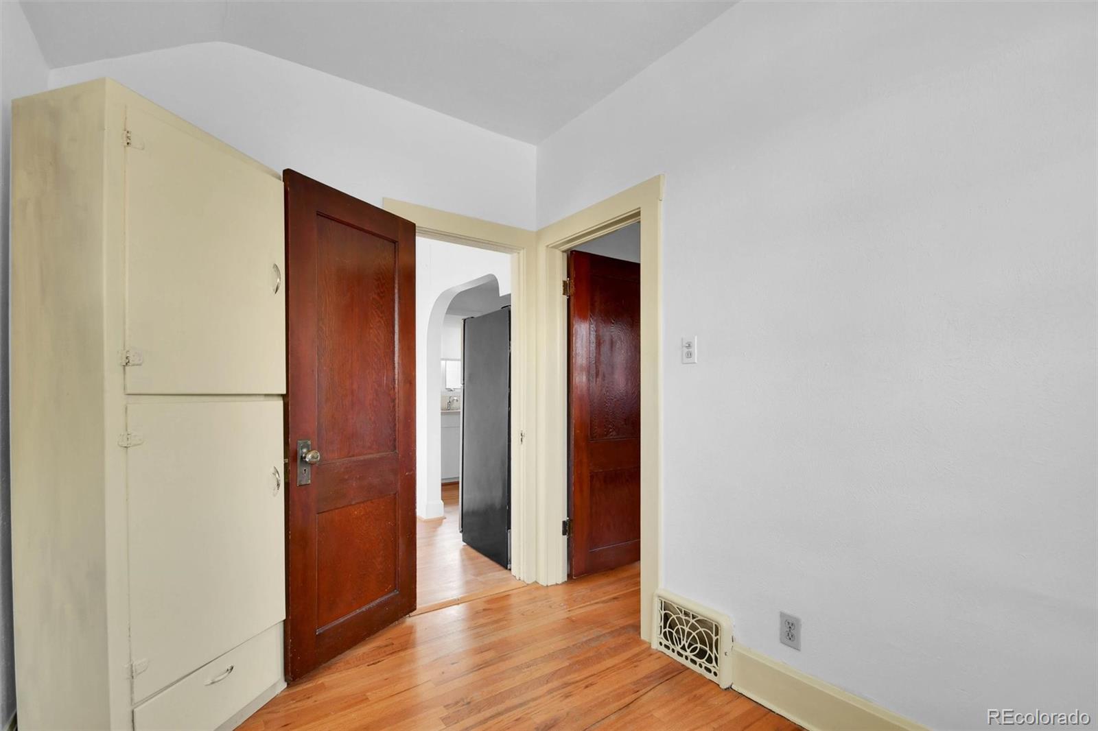 3159 West 36th Avenue Denver, CO 80211 - Photo 19 of 33 a view of hallway with wooden floor