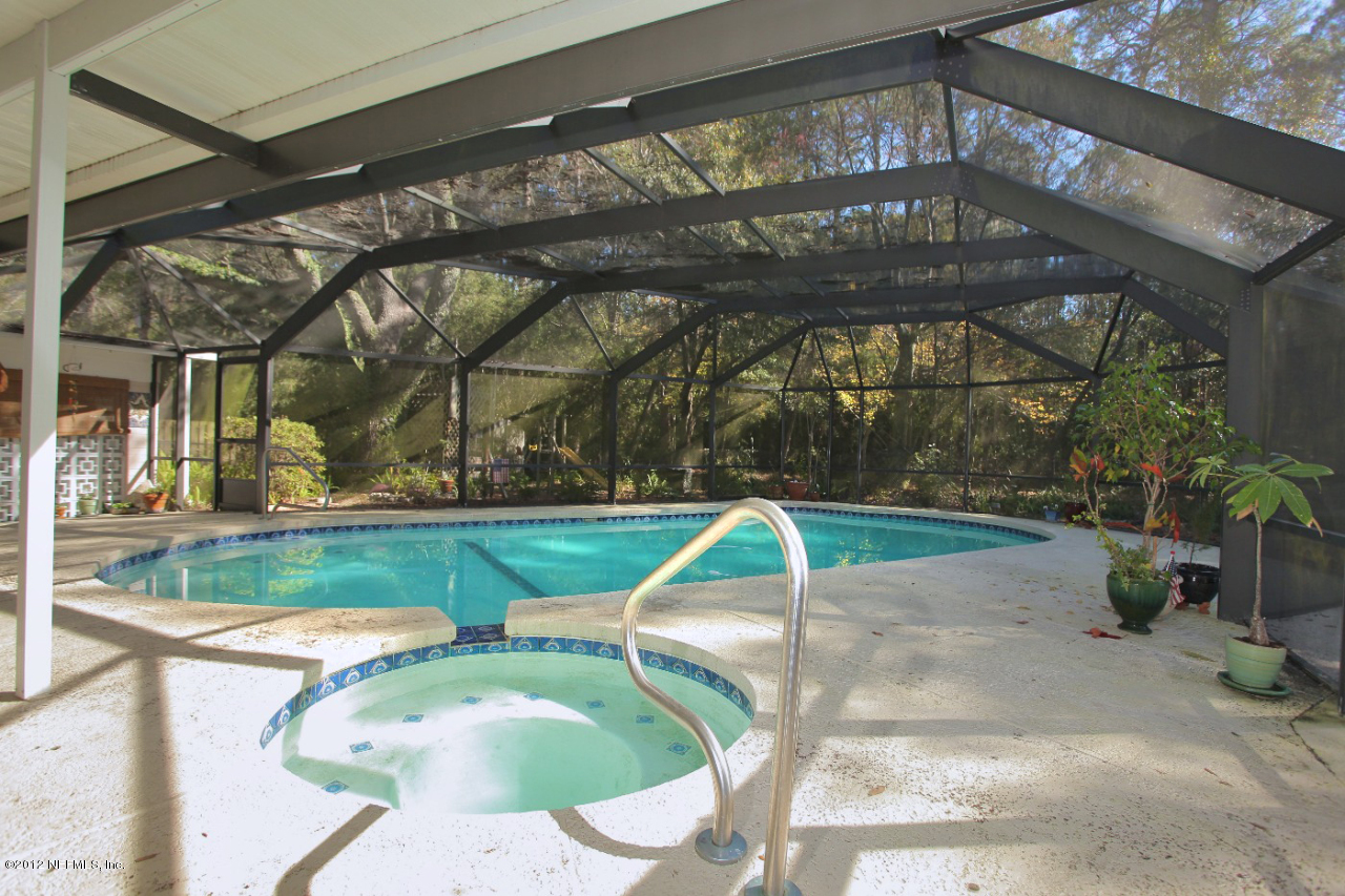 5719 Salerno Road Jacksonville, FL 32244 - Photo 21 of 27 Pool with Screen Enclosure