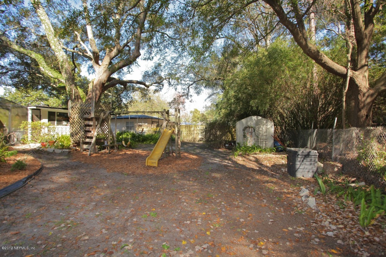 5719 Salerno Road Jacksonville, FL 32244 - Photo 24 of 27 Backyard beyond Pool