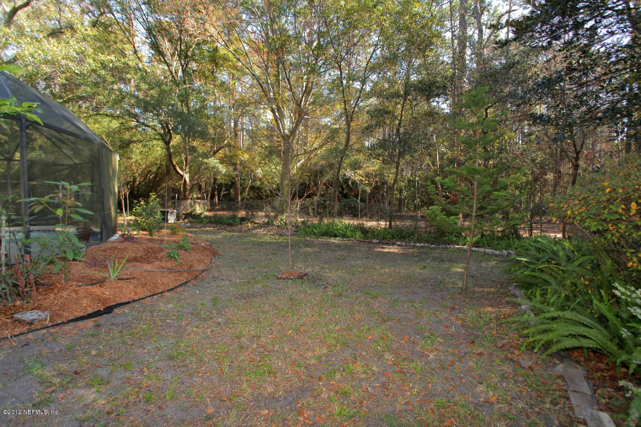 5719 Salerno Road Jacksonville, FL 32244 - Photo 26 of 27 Backyard beyond Pool